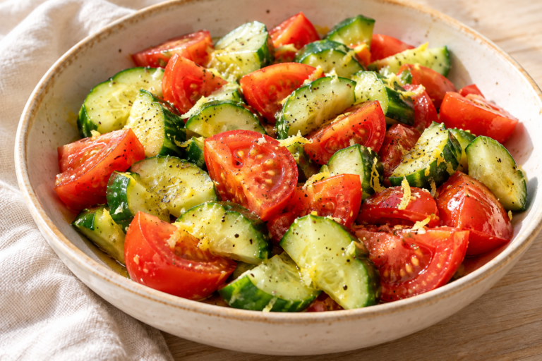 Fresh cucumber and tomato salad with lemon dressing
